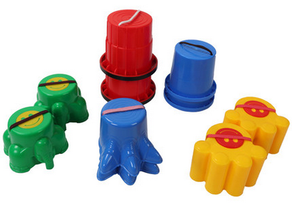 four pairs of children's sensory high shoes in colours green, blue, red and yellow, helping children to develop their balancing skills